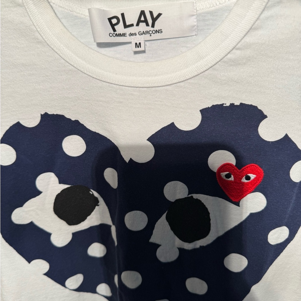Comme des Garcons. PLAY. 
White Tee with Navy Polka Dot Heart - Picture 7 of 14